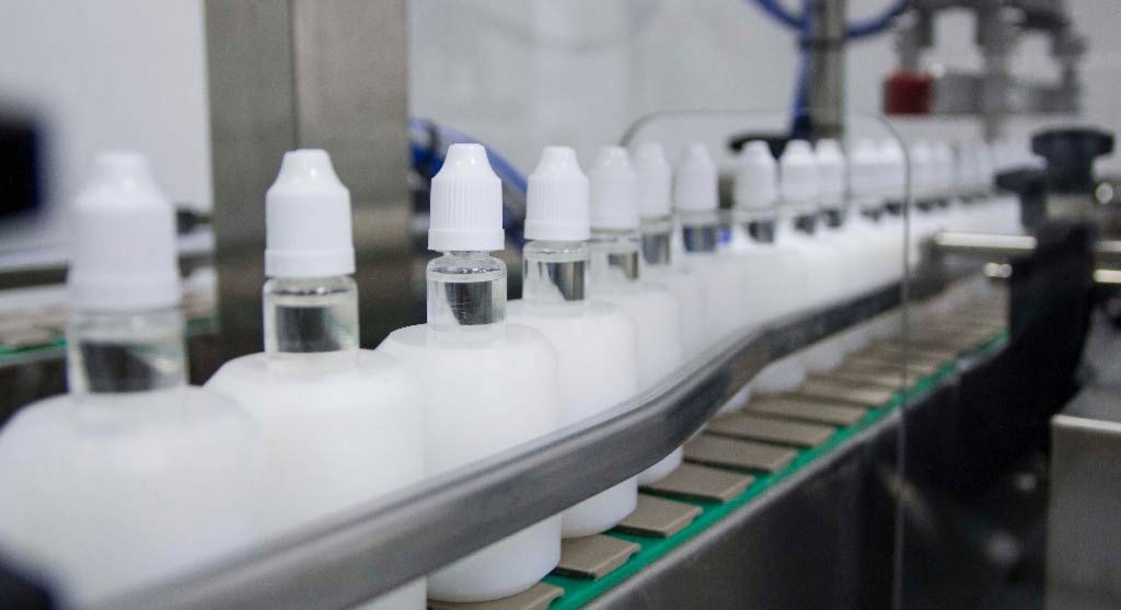 E-liquid bottles on production line Vaportitto United Kingdom